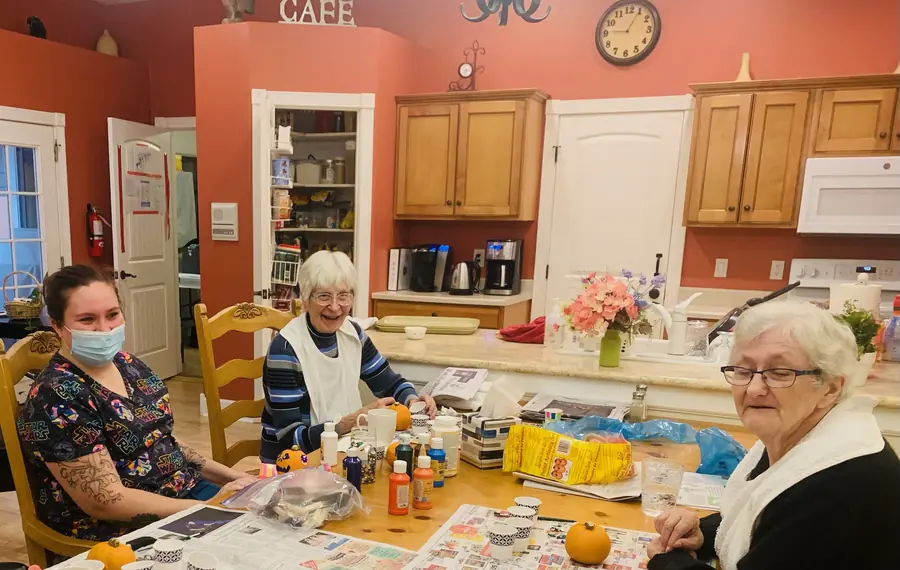 Caregiver with senior resident